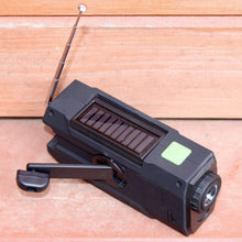 Load image into Gallery viewer, Ready Hour 4-in-1 Emergency Solar Flashlight & AM/FM/Weather Radio w/ Hand Crank